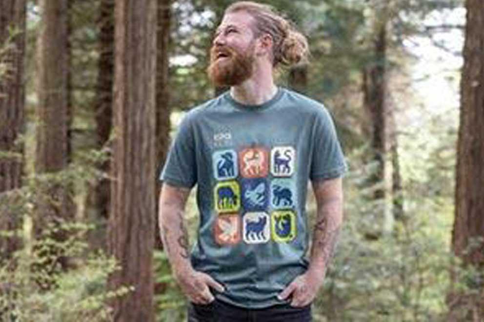 A male model wearing an RSPCA 200 year anniversary themed tee-shirt.