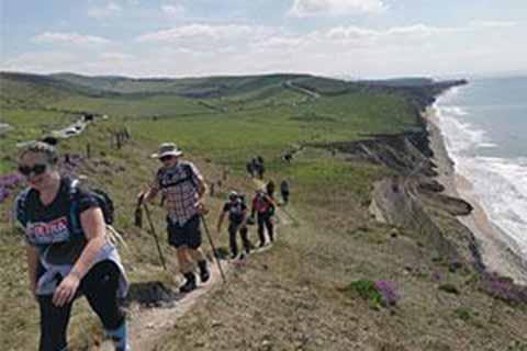 Fundraisers walking the Isle of Wight Coastal Path for charity.