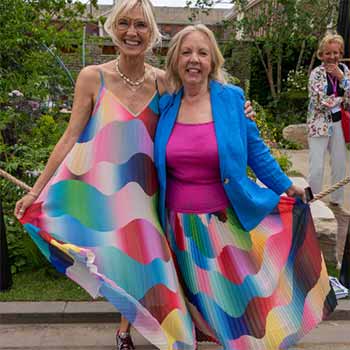 Radio presenter Jo Wiley and Deborah Meaden showing their beautifully coloured dresses off at RHS Chelsea Flower Show