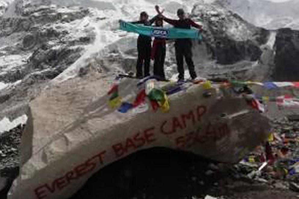 Fundraisers with an RSPCA flag on the Everest Base Camp.