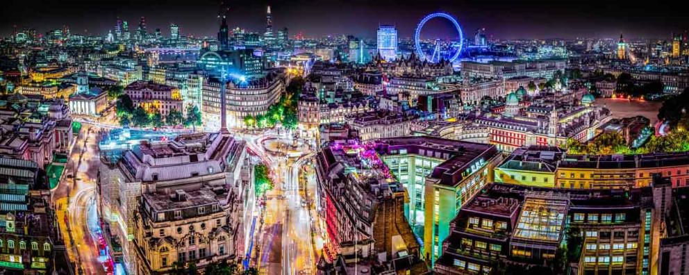 Aerial view of the London skyline at night.